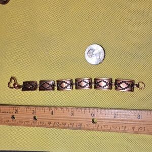 Southwest copper tribal style linked bracelet embossed and black annodized plate